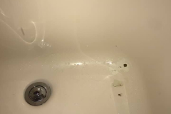 Damaged Fiberglass One Unit Bathtub